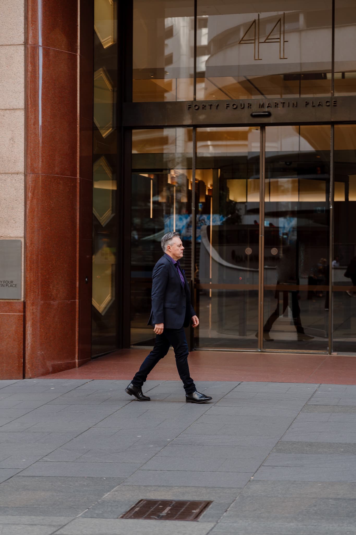 Mark Jones CSP walking through Sydney's CBD